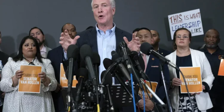 Sen. Chris Van Hollen, D-Md., speaks during a news conference upon his arrival from meeting with Kilmar Abrego Garcia in El Salvador, at Washington Dulles International Airport, in Chantilly, Va., Friday, April 18, 2025.