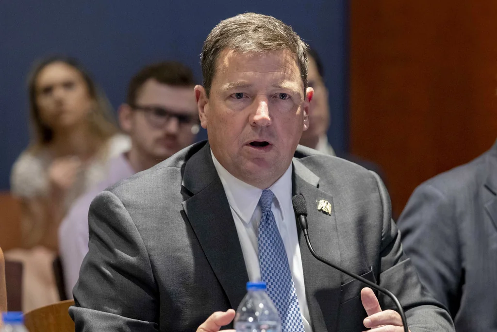 Ed Martin speaks at an event at the Capitol in Washington, with Washington Examiner reporter Brady Knox in the background, June 13, 2023.