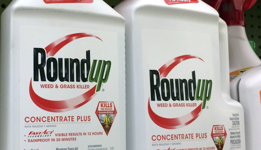 FILE - In this Jan. 26, 2017, file photo, containers of Roundup, a weed killer made by Monsanto, is seen on a shelf at a hardware store in Los Angeles. Republican lawmakers are threatening to cut off U.S. funding for the World Health Organizationâs cancer research program over its finding that the glyphosate herbicide Roundup is probably carcinogenic to humans.