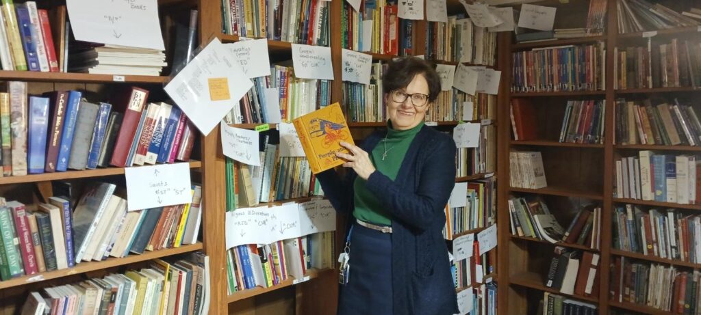 Connie Marshner at her library