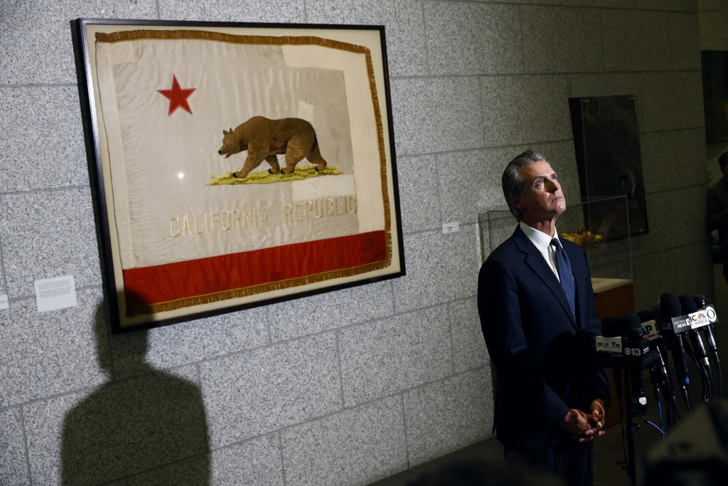 Gov. Gavin Newsom speaks to reporters on Thursday, June 12, 2025, at the California State Supreme Court building in San Francisco.