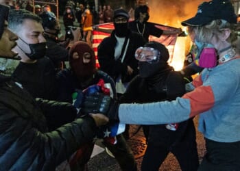 Left-wing activist arrested in brutal attack on reporter at anti-ICE protest in Seattle