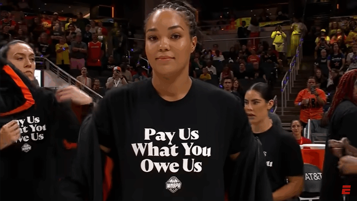 WNBA player wearing a stupid shirt.