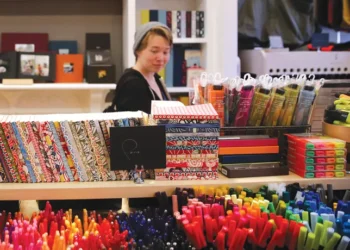 A customer browses the stationary displayed at Itoya Topdrawer in Boston. (Craig F. Walker/The Boston Globe via Getty Images)