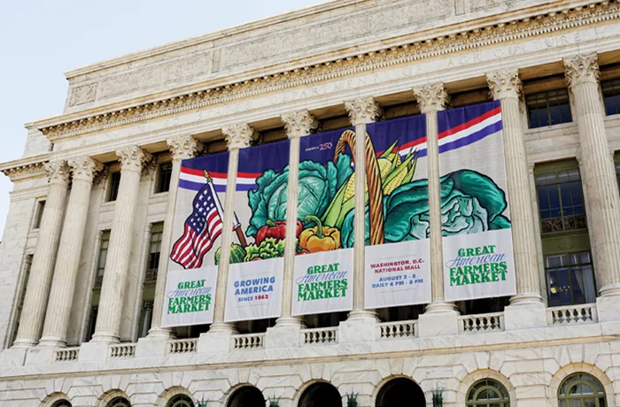 The front of the U.S. Department of Agriculture announces the Great American Farmers Market in Washington, D.C., Aug. 4, 2025. (Bryan Dozier/NurPhoto/AP)