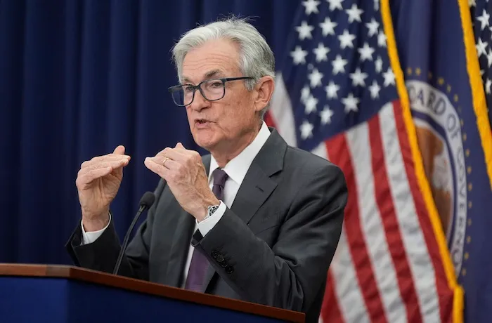 Dow hits record high after Fed Chair hints at September rate cuts