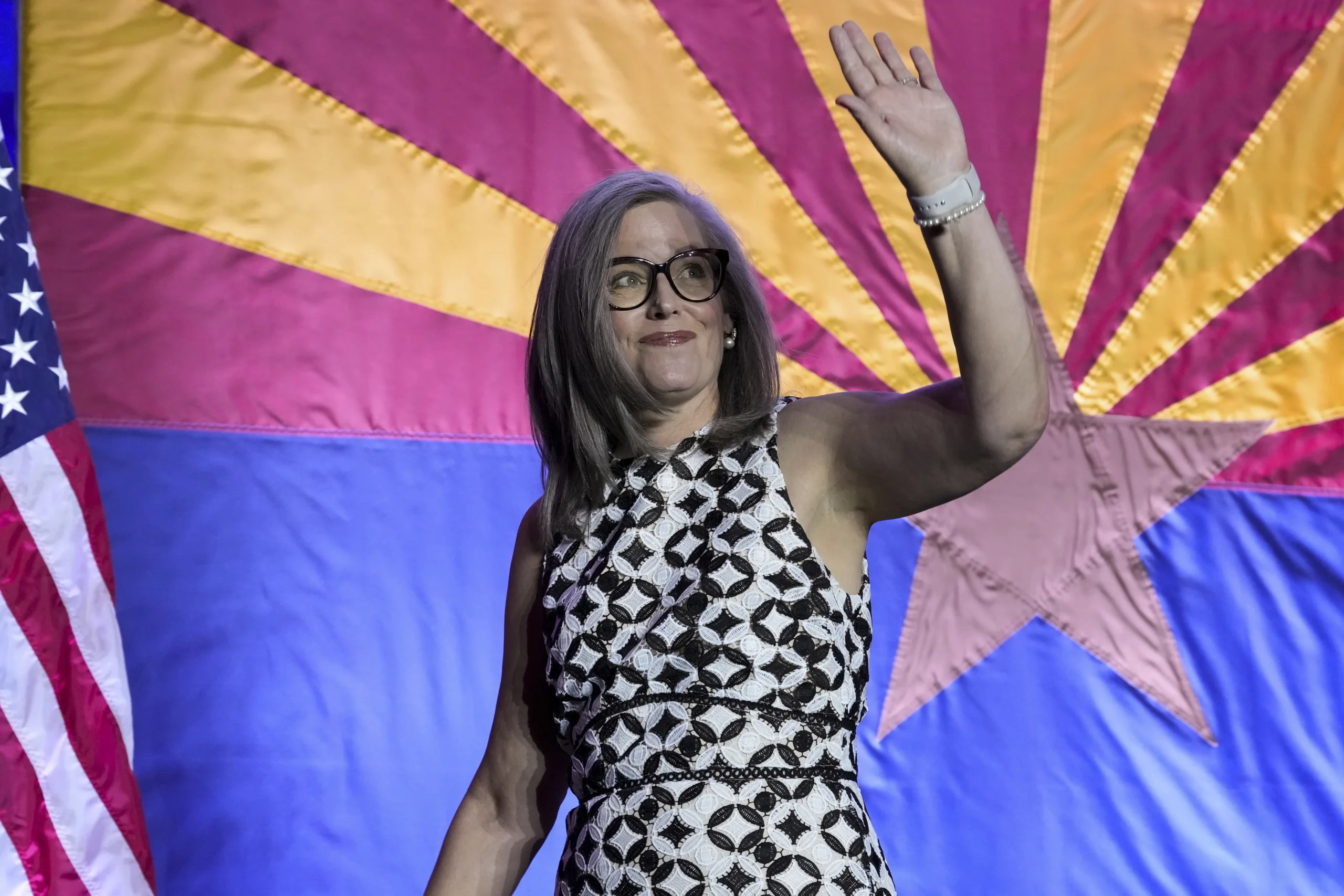 Arizona Gov. Katie Hobbs waves to the crowd after speaking during a watch party on election night Tuesday, Nov. 5, 2024, in Phoenix.