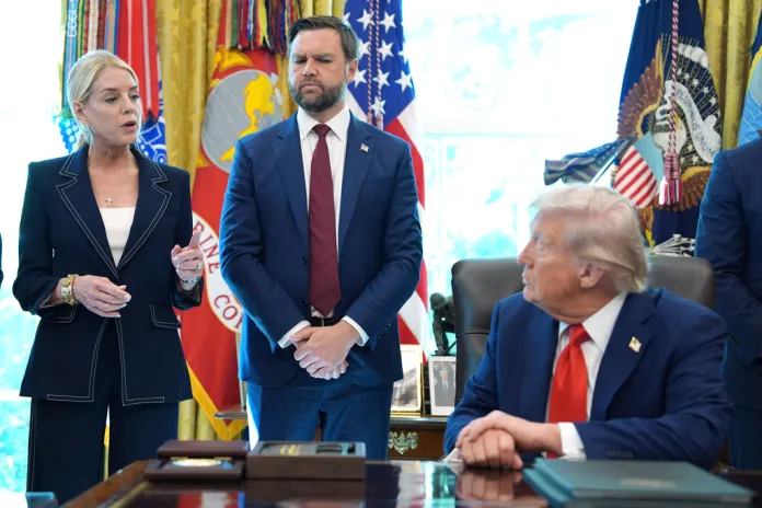 Attorney General Pam Bondi speaks to President Donald Trump in the Oval Office of the White House, Monday, Aug. 25, 2025, in Washington, as Vice President JD Vance looks on. (AP Photo/Evan Vucci)