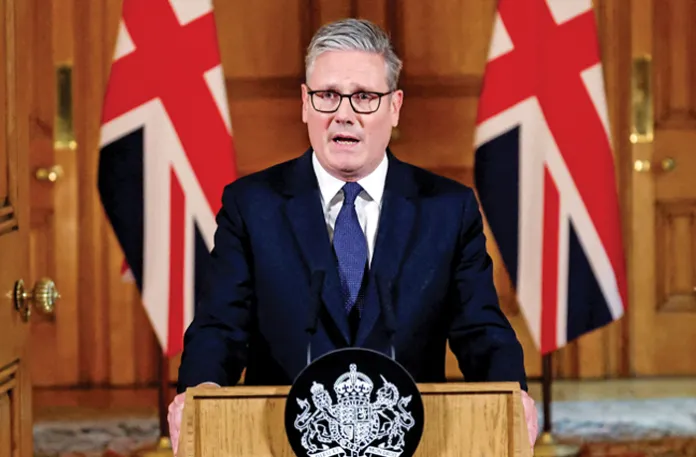 United Kingdom Prime Minister Keir Starmer speaks following an emergency cabinet meeting on Gaza in London, July 29, 2025. Starmer announced that the U.K. would recognize Palestine as a state on Sept. 21, 2025. (Toby Melville/AFP/Getty)