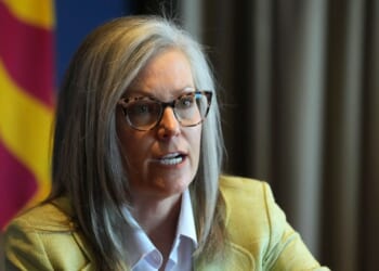 CCP businessman slides check to governor after she blocks anti-China bills