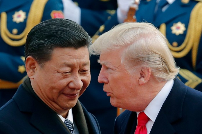 President Donald Trump talks with Chinese President Xi Jinping.