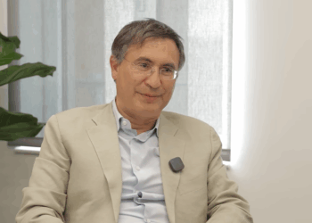 Christopher Hohn talking during an interview.