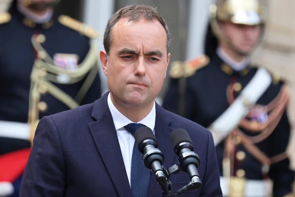 Newly named Prime Minister Sebastien Lecornu reacts as he speaks at the end of the handover ceremony.