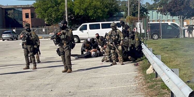 'Shoot the f**kers!' Anti-ICE agitators caught on video apparently calling for violence in wake of deadly Dallas shooting