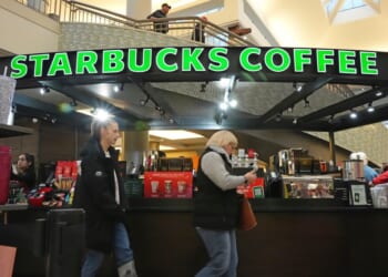 Starbucks to shutter stores, lay off employees in restructuring plan