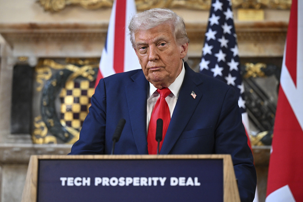 Trump predicts economy will improve 'probably in a year or so'