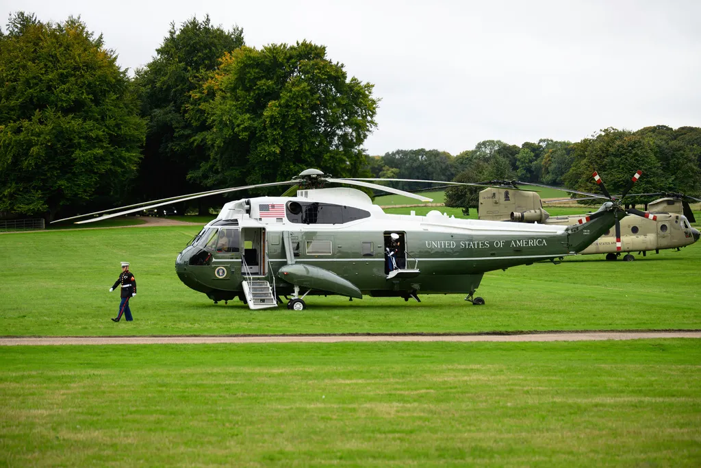 Marines operate around Marine One as President Donald Trump arrives at Chequers, near Aylesbury, England, Thursday, Sept. 18, 2025. 
