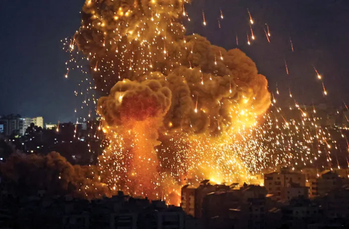 Israeli fire targets Beirut buildings after the launch of a ground offensive against Hezbollah sites in Lebanon, Oct. 6, 2024. (Ugur Yildirim/Getty)