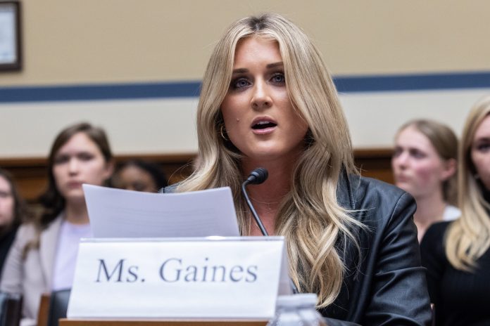Former collegiate swimmer Riley Gaines testifies during a House Oversight Subcommittee on Health Care and Financial Services hearing on Capitol Hill December 5, 2023 in Washington, D.C. The hearing focused on the Biden administration's proposed rule changes to Title IX to redefine the definition of sexual discrimination to include gender identity.