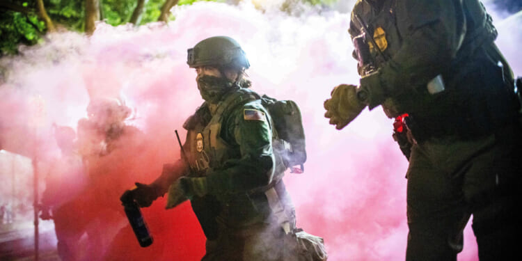 Trump open to invoking Insurrection Act after troop deployments