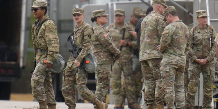 Texas National Guard members staged outside of Chicago