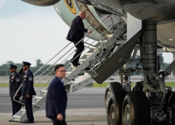 Trump boards Air Force One using small stairs after hunting stand found at airport