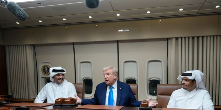 Emir of Qatar joins Trump on Air Force One during trip to Asia