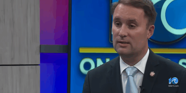 Jason Miyares talking during an interview.