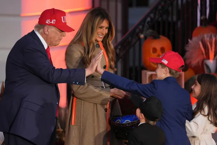 President Donald Trump and first lady Melania Trump participate in a Halloween event