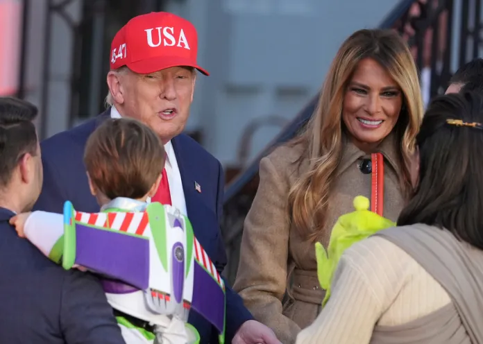 President Donald Trump and first lady Melania Trump participate in a Halloween event