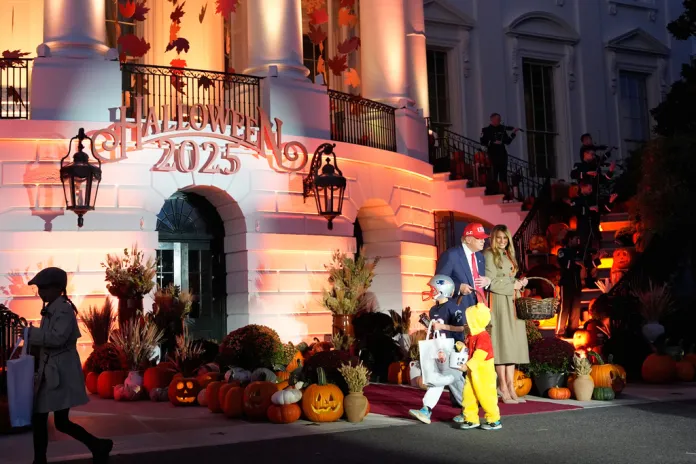 President Donald Trump and first lady Melania Trump participate in a Halloween event