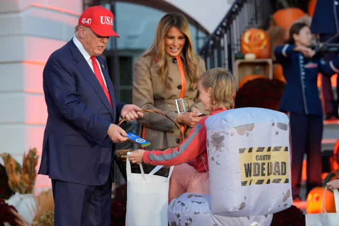 President Donald Trump and first lady Melania Trump participate in a Halloween event