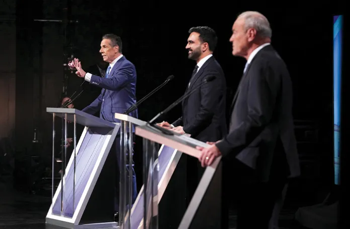 From left, independent candidate former New York Gov. Andrew Cuomo, Democratic candidate Assemblyman Zohran Mamdani and Republican candidate Curtis Sliwa participate in a mayoral debate at LaGuardia Community College in the Queens borough of New York on Oct. 22. (HIROKO MASUIKE/THE NEW YORK TIMES VIA AP)