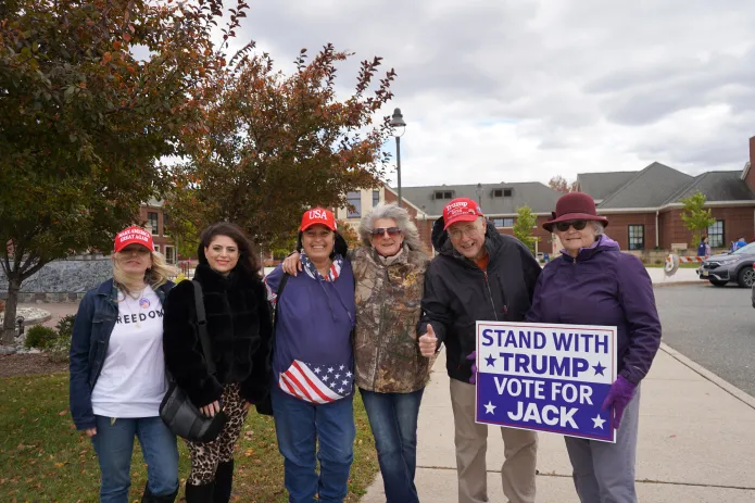 A group of members of "Trump's Corner" in Bedminster, New Jersey, gather to support Republican gubernatorial nominee Jack Ciattarelli