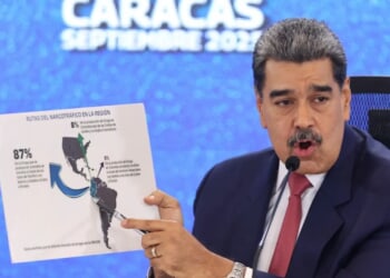 Trump denies approving strikes on Venezuela but overwhelming military presence suggests more to come