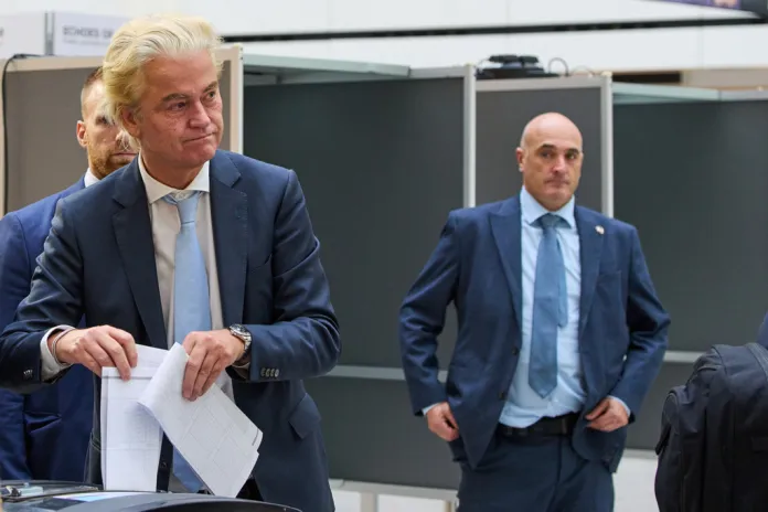 Right-wing anti-Islam lawmaker Geert Wilders casts his vote at a polling station.