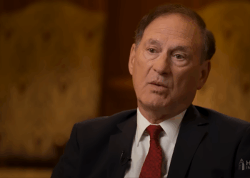 Samuel Alito talking during an interview.