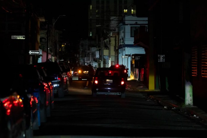 A dark Puerto Rican street during a blackout.