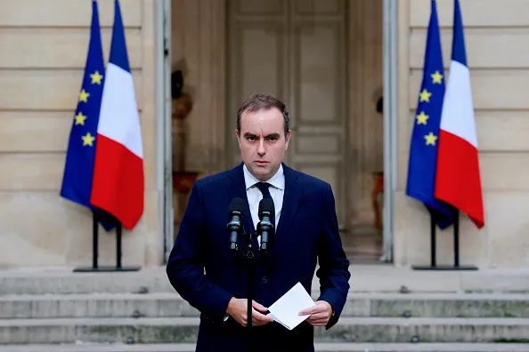 French outgoing Prime Minister Sebastien Lecornu gives a statement on the sidelines of his talks with political parties' leaders in a bid to form a coalition government, able to pass an austerity budget through parliament, at the Hotel Matignon in Paris on October 8, 2025. The clock ticked down for France's President to find an exit from his worst domestic crisis, after his first prime minister and one-time ally urged him to resign.The prime minister, the third premier since those polls, on October 5, 2025 threw in the towel just hours after broad rejection of his new cabinet.