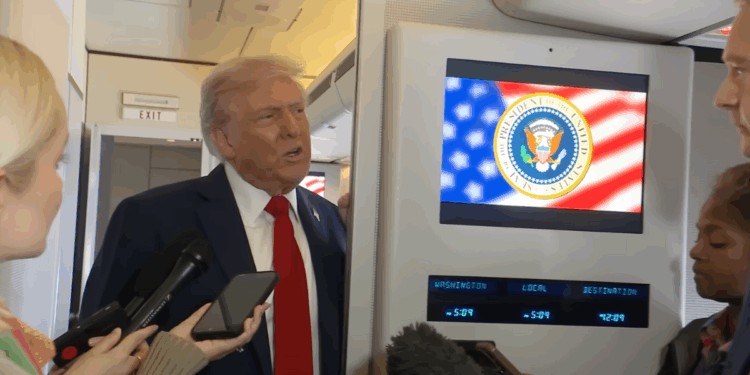Donald Trump speaking to press on Air Force One