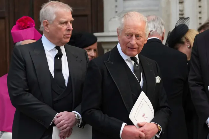 Britain's Prince Andrew, left, and Britain's King Charles III