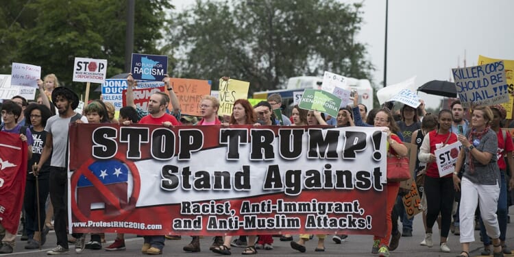 About 400 protesters gathered outside the Minneapolis Convention Center where Donald Trump was holding a private fundraising event.