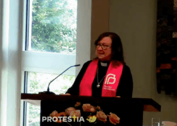 Rebecca Todd Peters speaking in Planned Parenthood garb