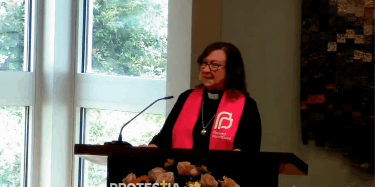 Rebecca Todd Peters speaking in Planned Parenthood garb