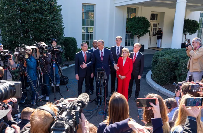 Senate Majority Leader John Thune (R-SD) and other Republican Senate members speak with reporters after a meeting with President Donald Trump at the White House on Oct. 21. (Alex Brandon/AP)