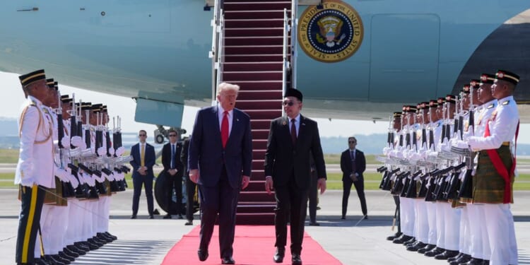 Trump lands in Malaysia for first stop in high-stakes Asia trip