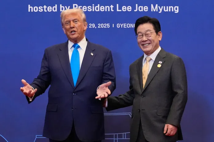 President Donald Trump poses for a photo with South Korean President Lee Jae Myung during a dinner event in Gyeongju, South Korea, Wednesday, Oct. 29, 2025.