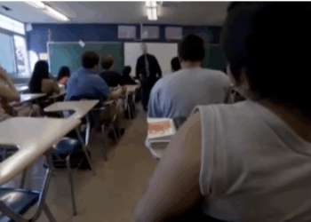 Wisconsin high school students and their teacher in the classroom.