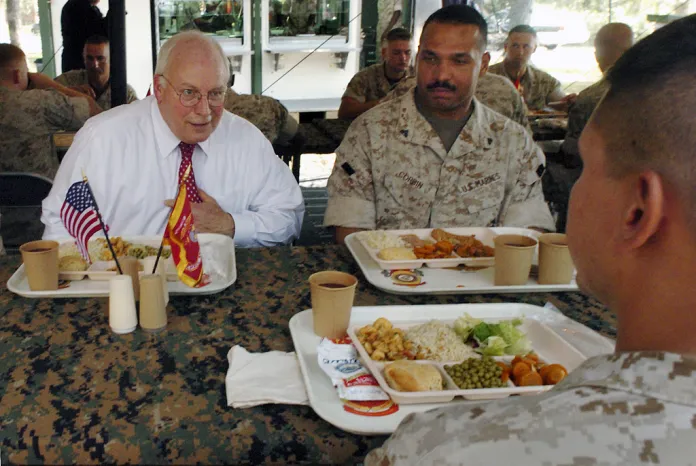 FILE- Vice President Dick Cheney talks with a Marine and Cpl. Todd J. Corbin, right, of Sandusky Ohio, during a luncheon with marines from the 3rd Battalion, 25th Marine Regiment in an outdoor field house on Monday, Oct. 3, 2005 at Camp Lejeune, NC.
