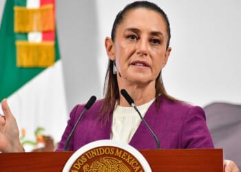 Video appears to show possibly drunken man trying to grope and kiss Mexican president in public